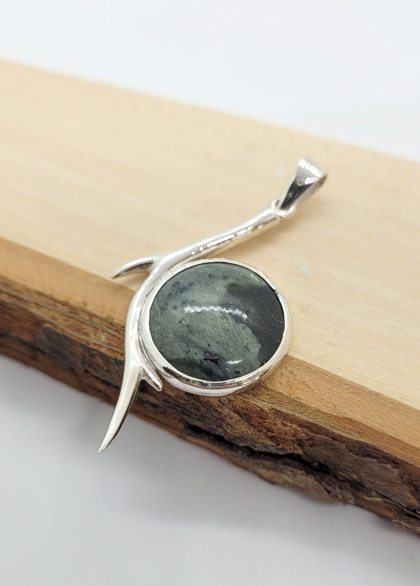 Branch and round Serpentinite pendant